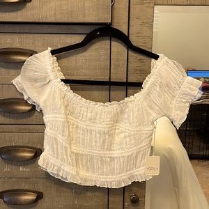 Free people crop top in white!
